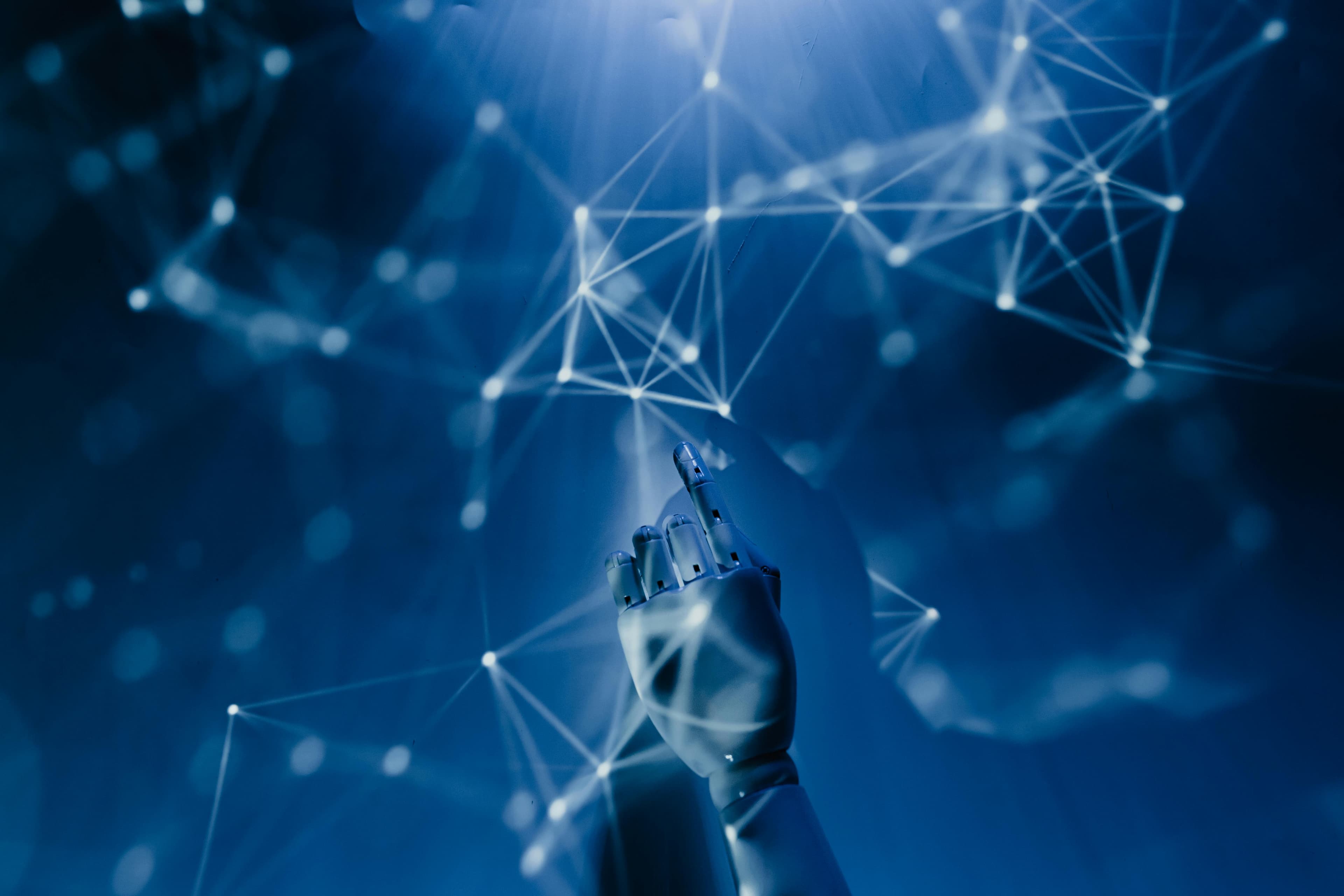Abstract particles forming a human silhouette — an emergent AI self